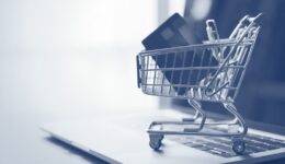Shopping cart and credit card on laptop,online shopping and delivery service concept.