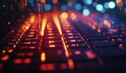Vibrant Laptop Keyboard with Abstract Light Bokeh