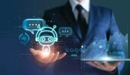 .Businessman holding digital chatbot are assistant conversation for provide access to data growth of business in online network, Robot application and global connection, AI, Artificial intelligence.